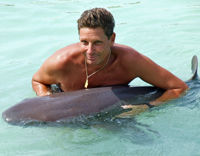 The Swim, Hold and Feed the Sharks Program
