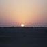 Sunset over the desert 4x4 Desert Wonder Safari - Sandboarding, BBQ Dinner and Bellydancer