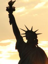 Statue of Liberty at sunset The New York Pass