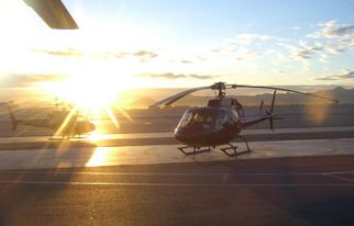 Flying out at sunrise Grand Canyon All American Helicopter Flight