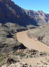 The muddy Colorado River Grand Canyon All American Helicopter Flight
