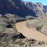 The muddy Colorado River Grand Canyon All American Helicopter Flight