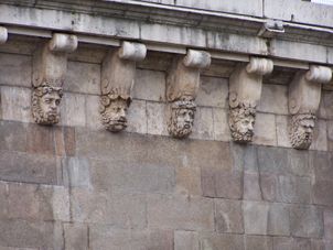 Faces under a Bridge The Paris Pass