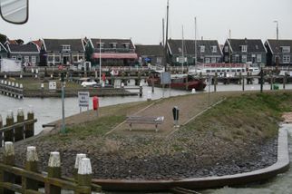 Arriving in Marken Half Day Tour to Zaanse Schans Windmills, Marken and Volendam